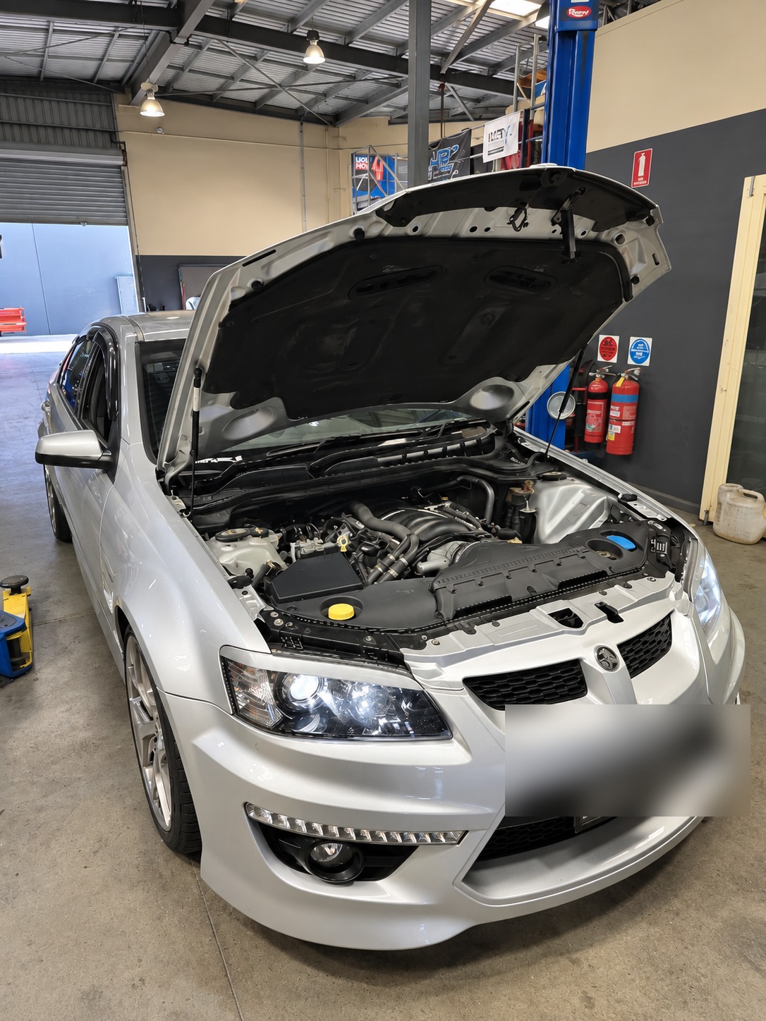 HSV Clubspot before the build began, hood up for the initial inspection